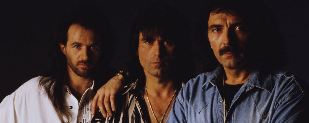 Tony Martin, Cozy Powell, and Tommy Iommi.