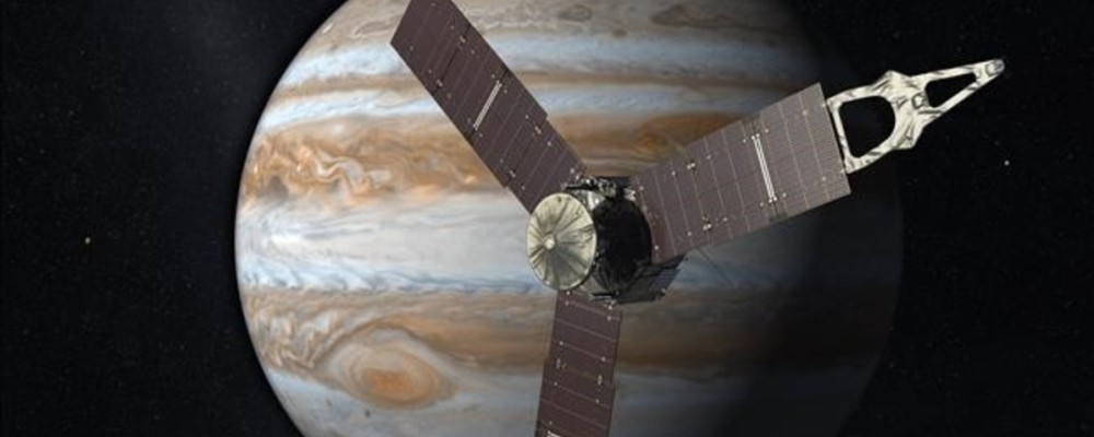 This artist s rendering provided by NASA and JPL-Caltech shows the Juno spacecraft above the planet Jupiter  Five years after its launch from Earth  Juno is scheduled to go into orbit around the gas giant on Monday  July 4  2016   NASA JPL-Caltech via AP