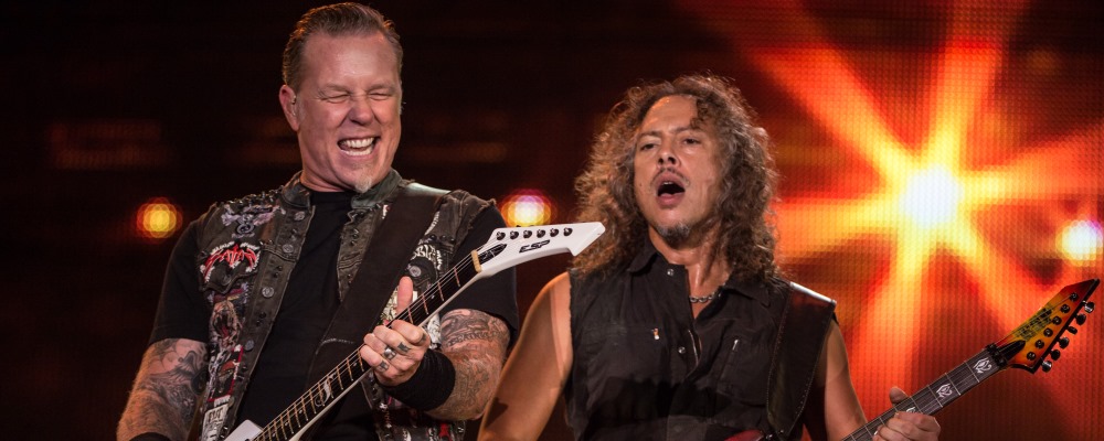 James Hetfield (L) and Kirk Hammett of American heavy metal band Metallica perform during the Rock in Rio music festival in Rio de Janeiro, Brazil, on September 20, 2013. AFP PHOTO / YASUYOSHI CHIBA        (Photo credit should read YASUYOSHI CHIBA/AFP/Getty Images)